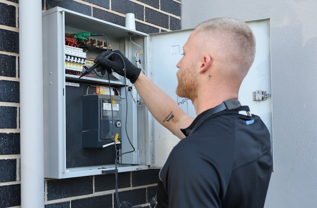 Nexum electrician testing a residential switchboard
